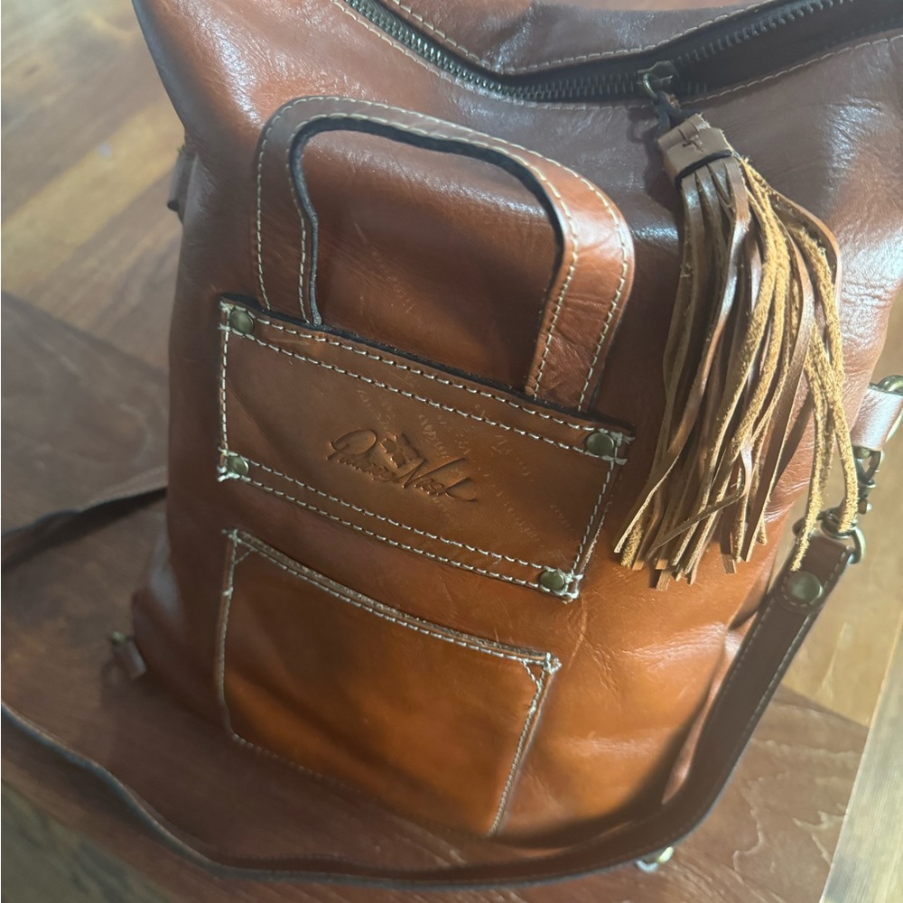 Patricia Nash leather zip top convertible backpack/purse.